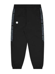 Moonface logo tape track pants