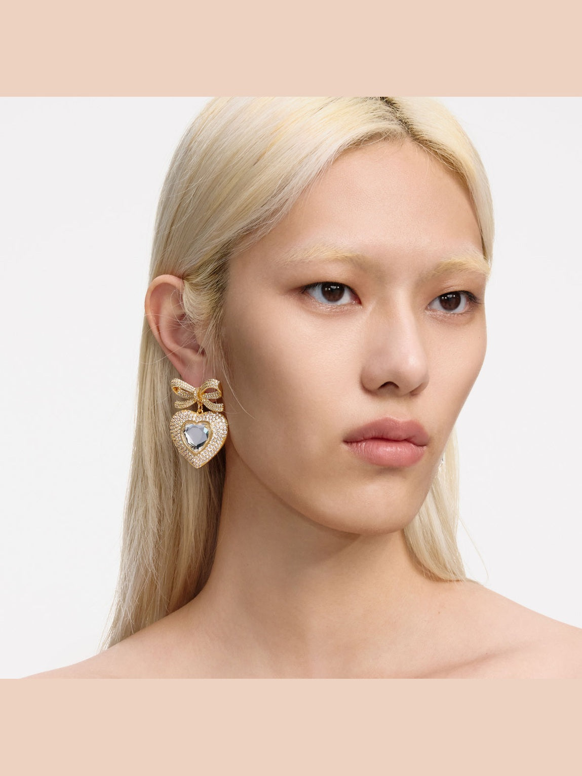 Gold bow crystal heart earrings