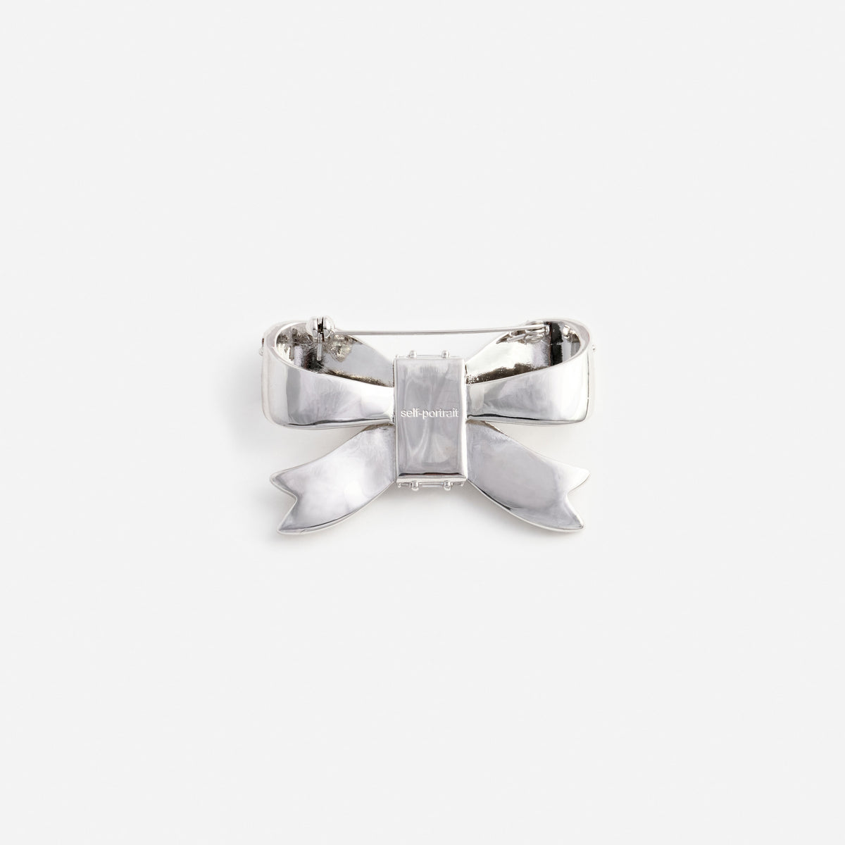 Crystal bow brooch