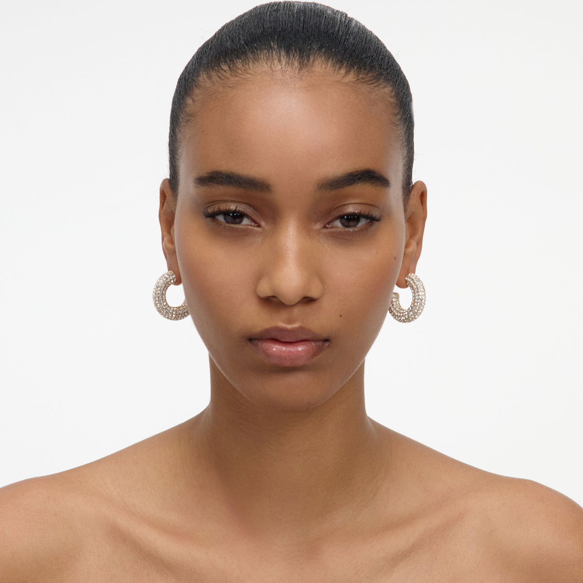 Gold crystal hoop earring