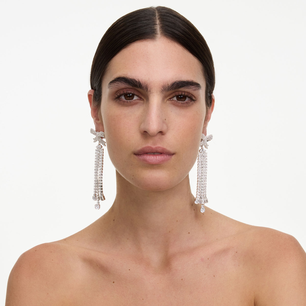 Silver crystal bow droplet earrings