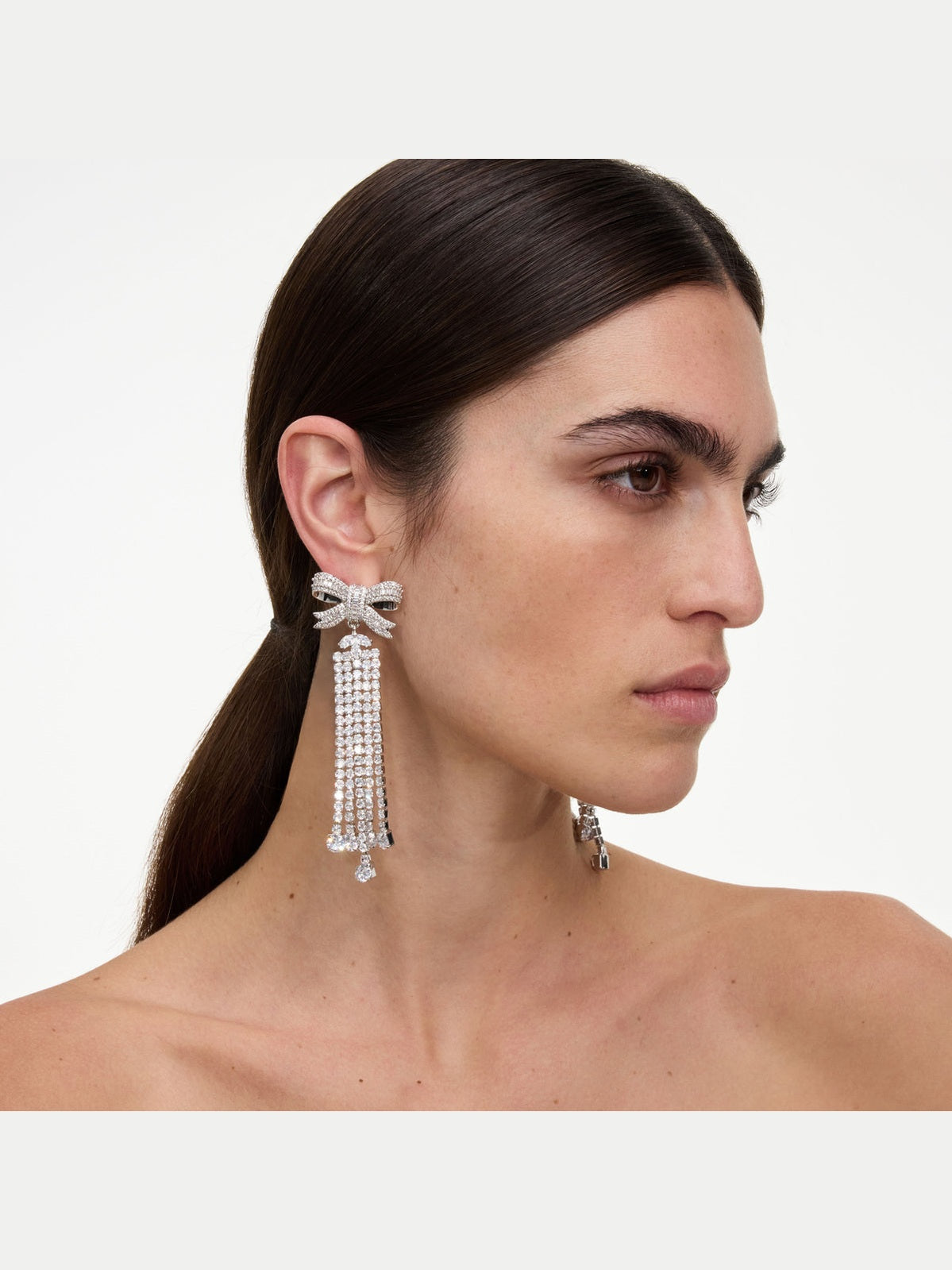 Silver crystal bow droplet earrings
