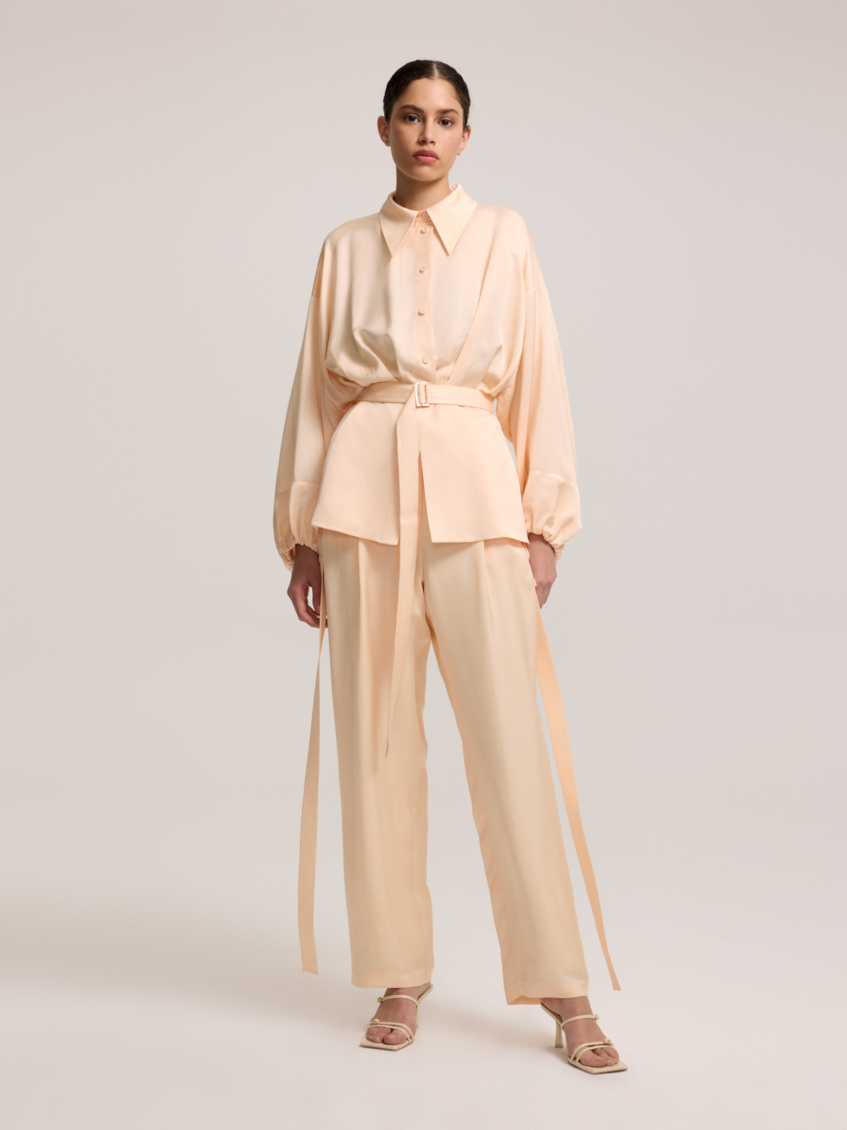Salmon color belted blouse