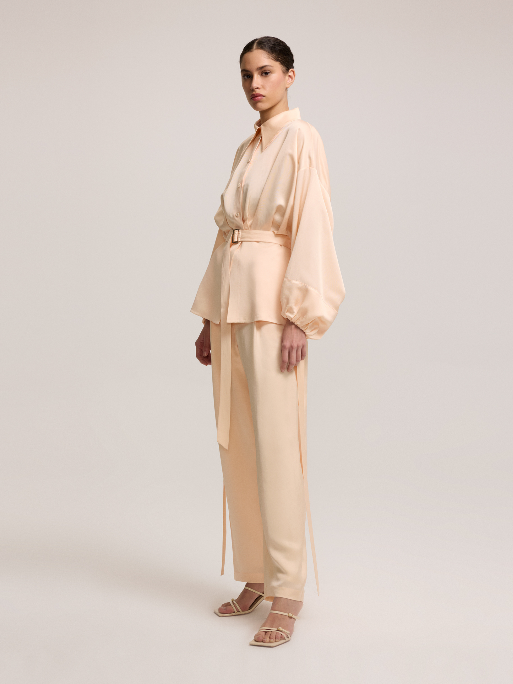 Salmon color belted blouse
