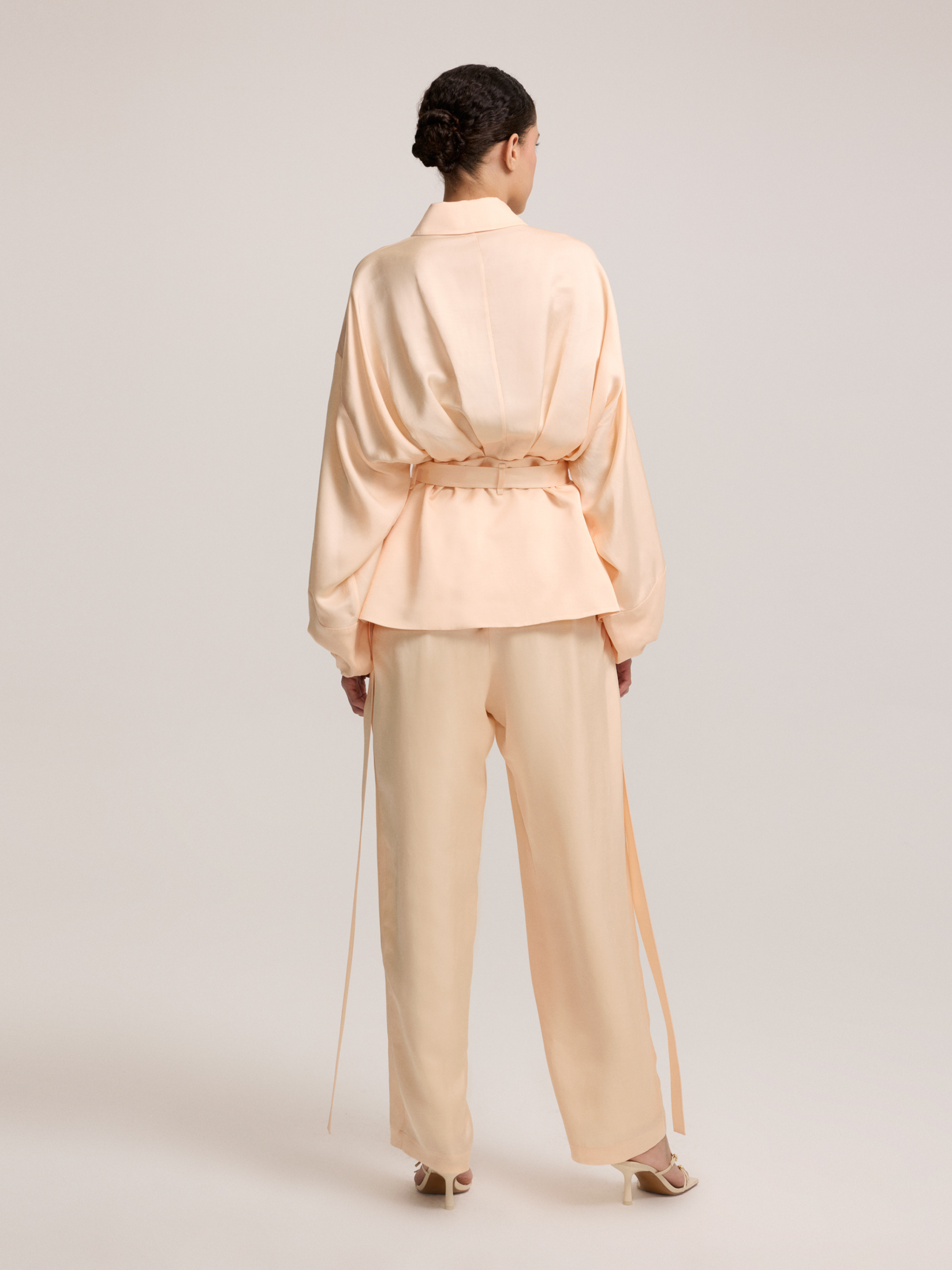 Salmon color belted blouse