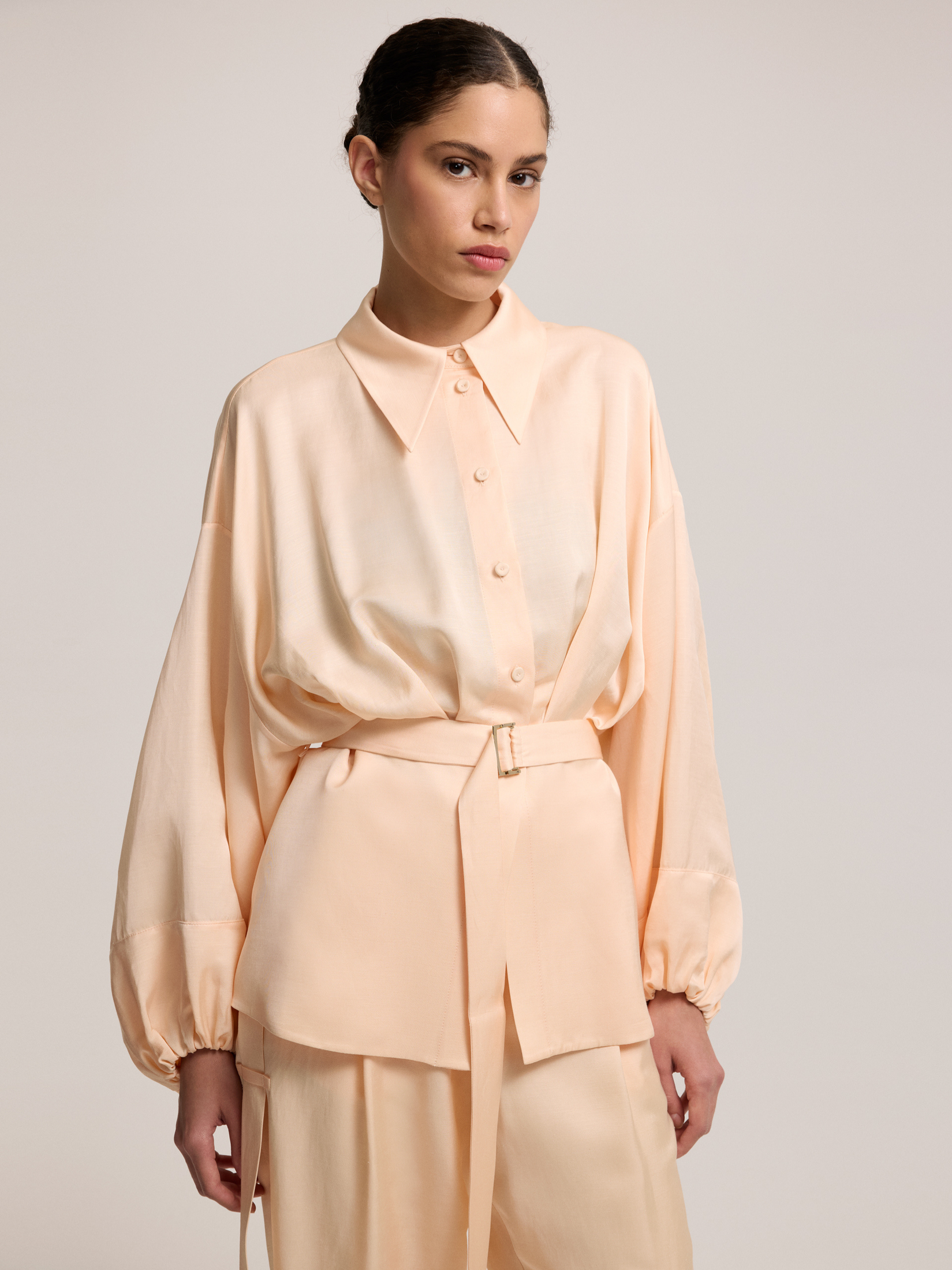 Salmon color belted blouse