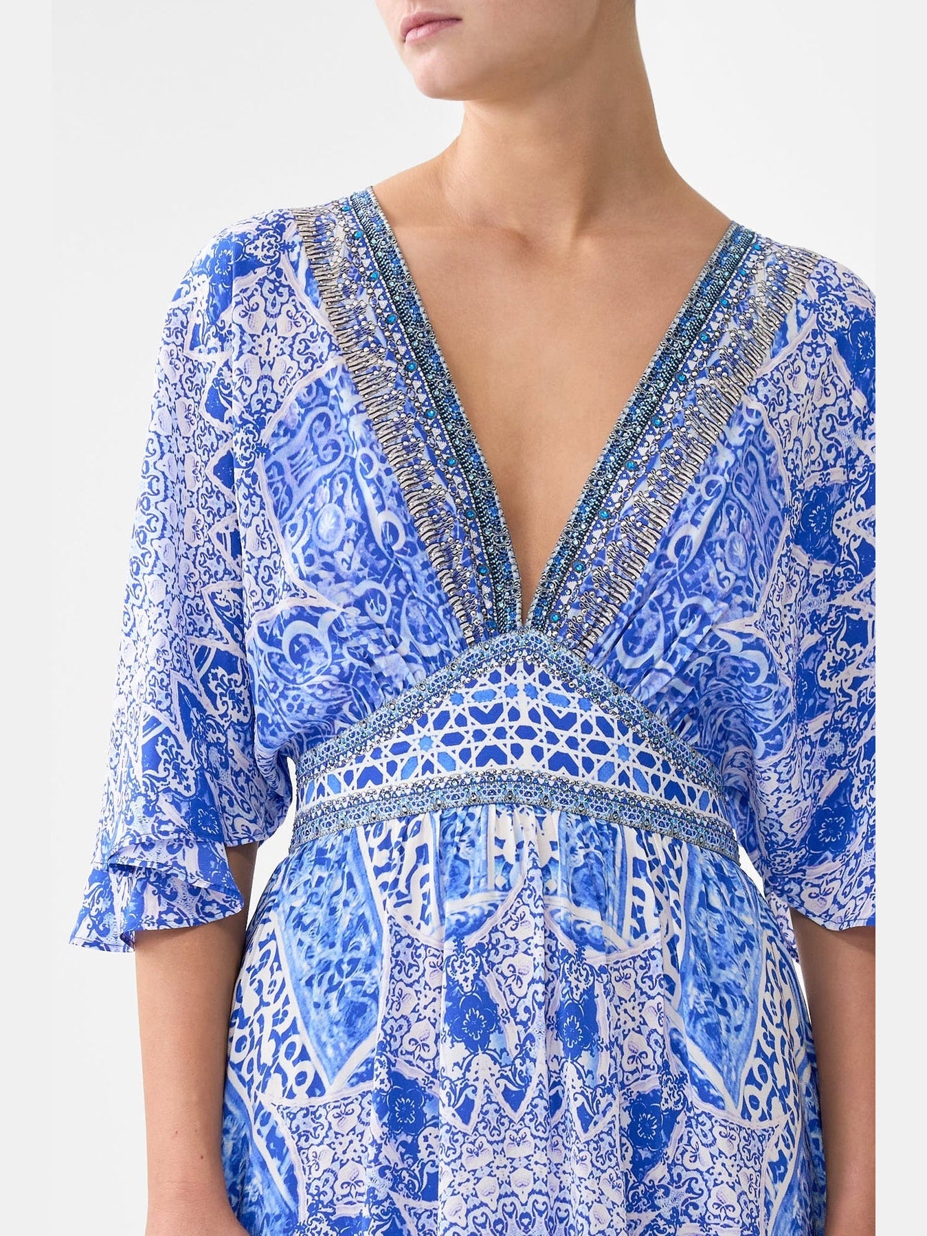 Waisted dress with hem ruffle