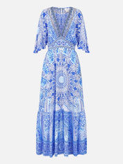 Waisted dress with hem ruffle