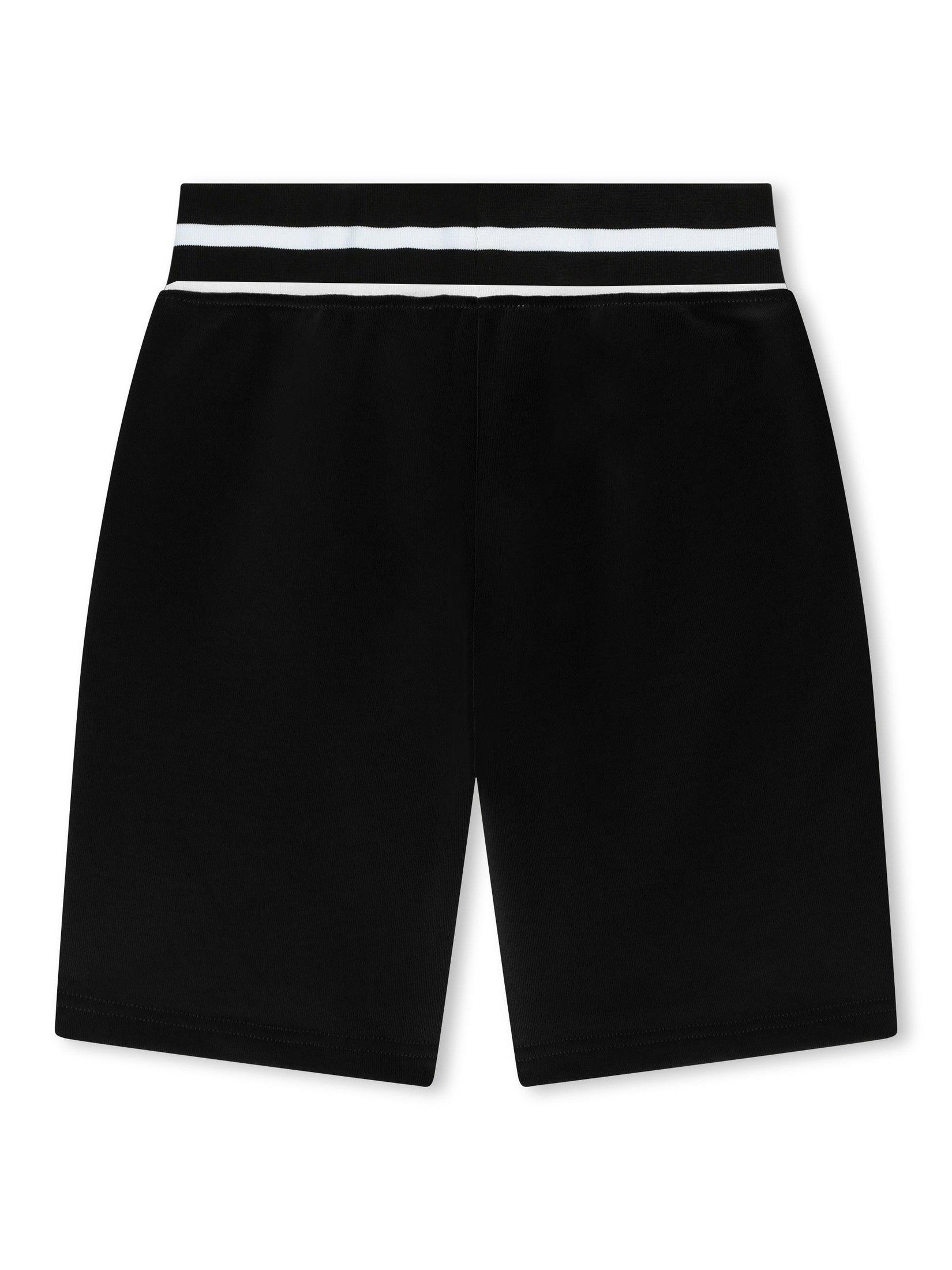 T-shirt and bermuda shorts