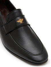 Black leather heeled flaneur