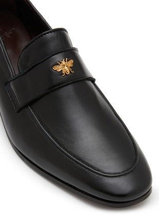 Black leather heeled flaneur