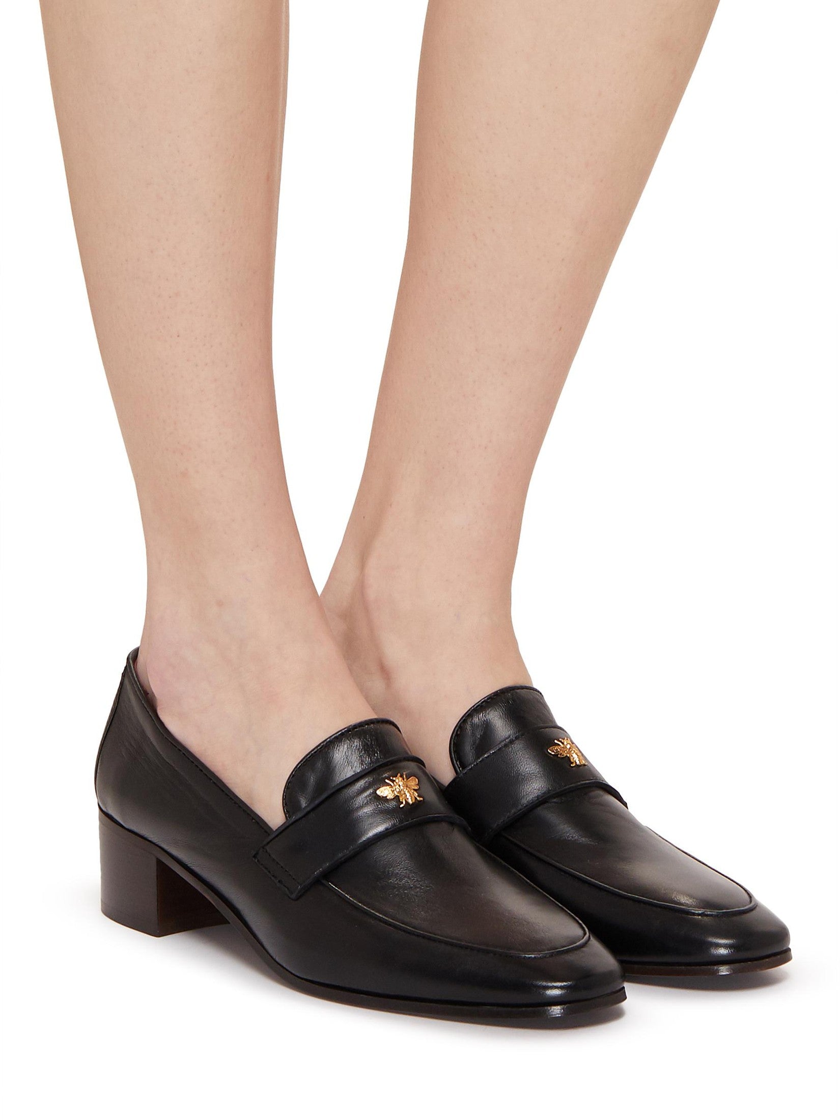 Black leather heeled flaneur