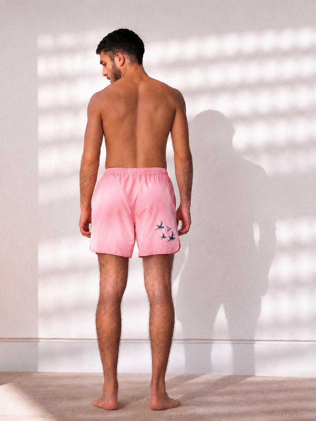 Pink swim shorts