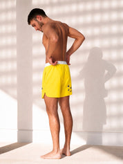 Yellow swim shorts