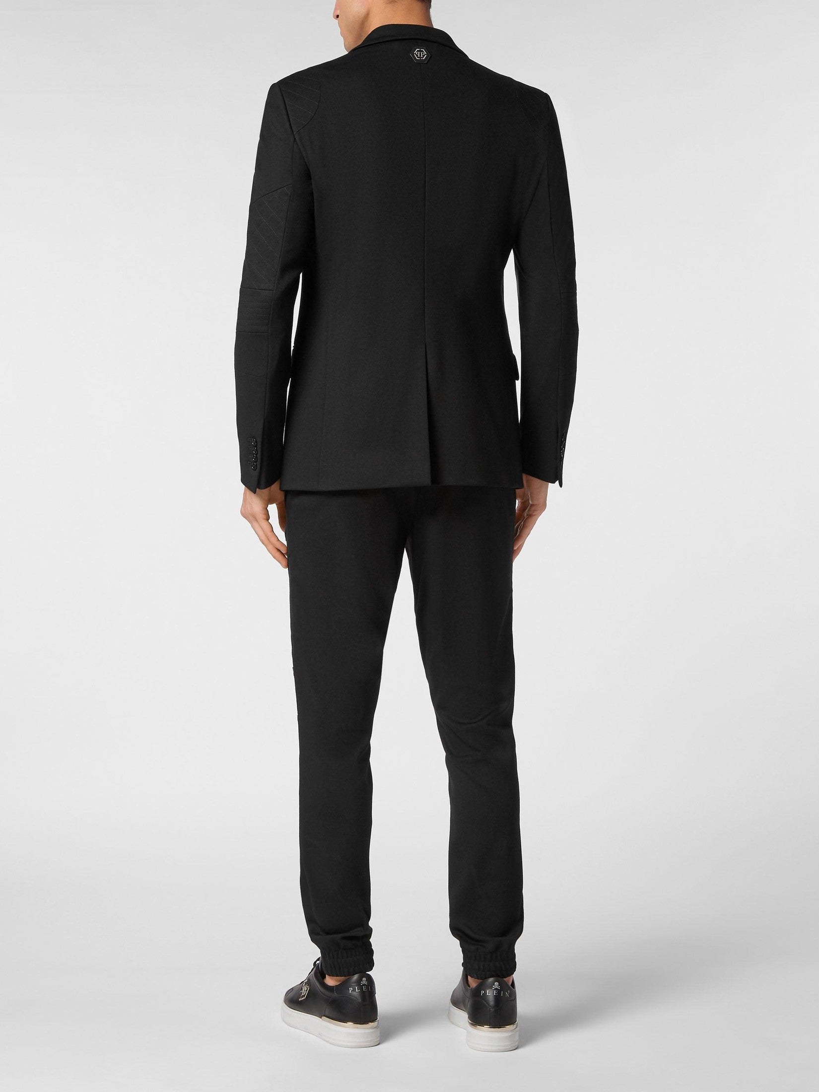 Suit with trousers