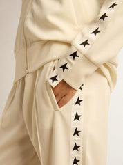 Women’s white zipped sweatshirt with white strip and black stars