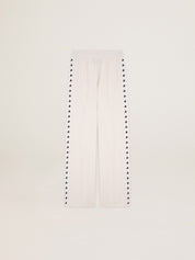 Women’s white joggers with stars on the sides