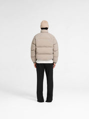 Funnel neck puffer
