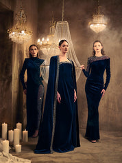 Asymmetric velvet blue dress with tulle and crystal embroidery