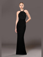 Black crêpe dress with chainmail crystal flower