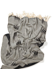 Peshtemal cotton ikat throw blanket