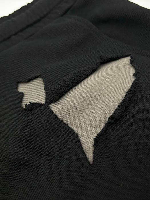 Ripped up straight leg sweatpants