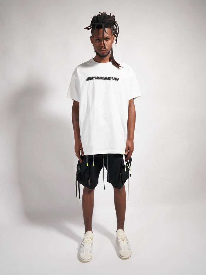 Split mostly heard tee
