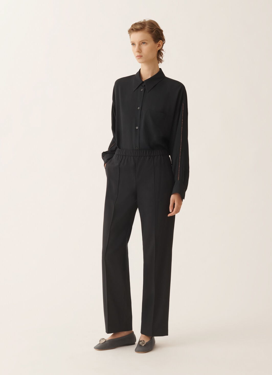 Bistretch wool jogging trousers with filo diamante