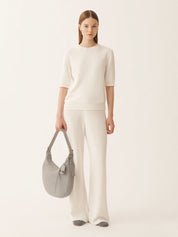 White cotton and linen pants with sequins