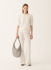 White cotton and linen pants with sequins