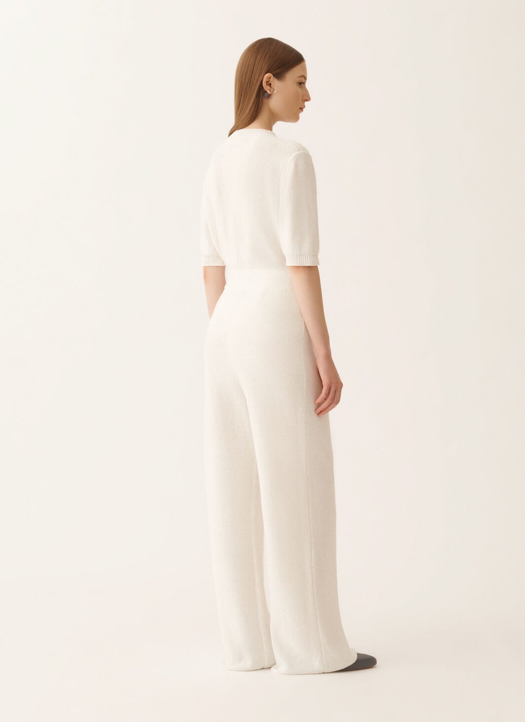 White cotton and linen pants with sequins