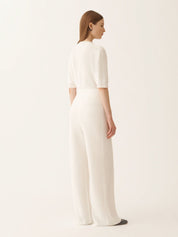 White cotton and linen pants with sequins