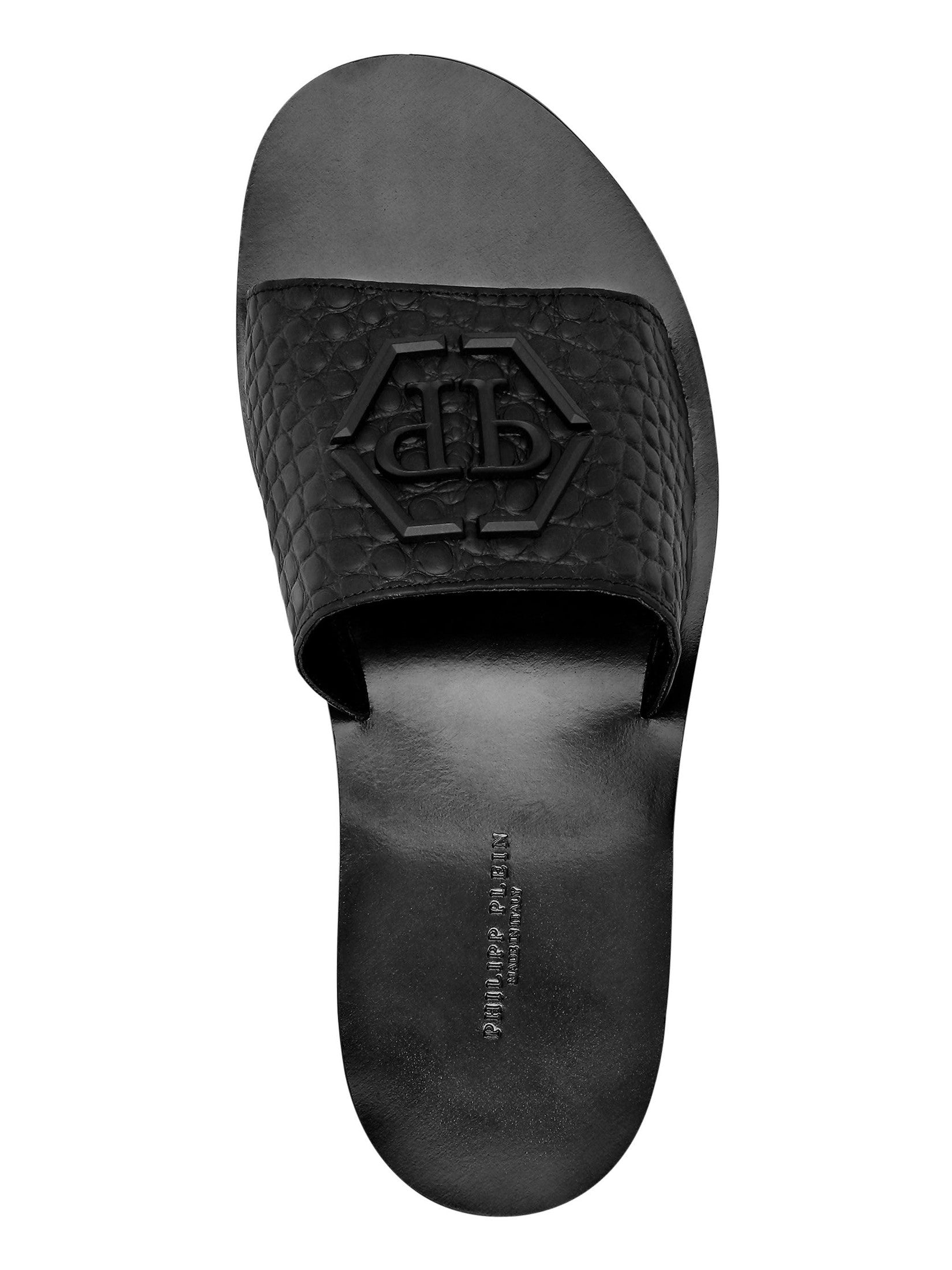 Flat crocco printed sandals