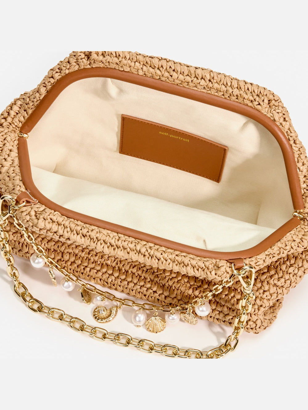 Raffia charm shoulder bag