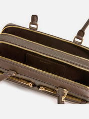 Brown leather baguette shoulder bag with charm