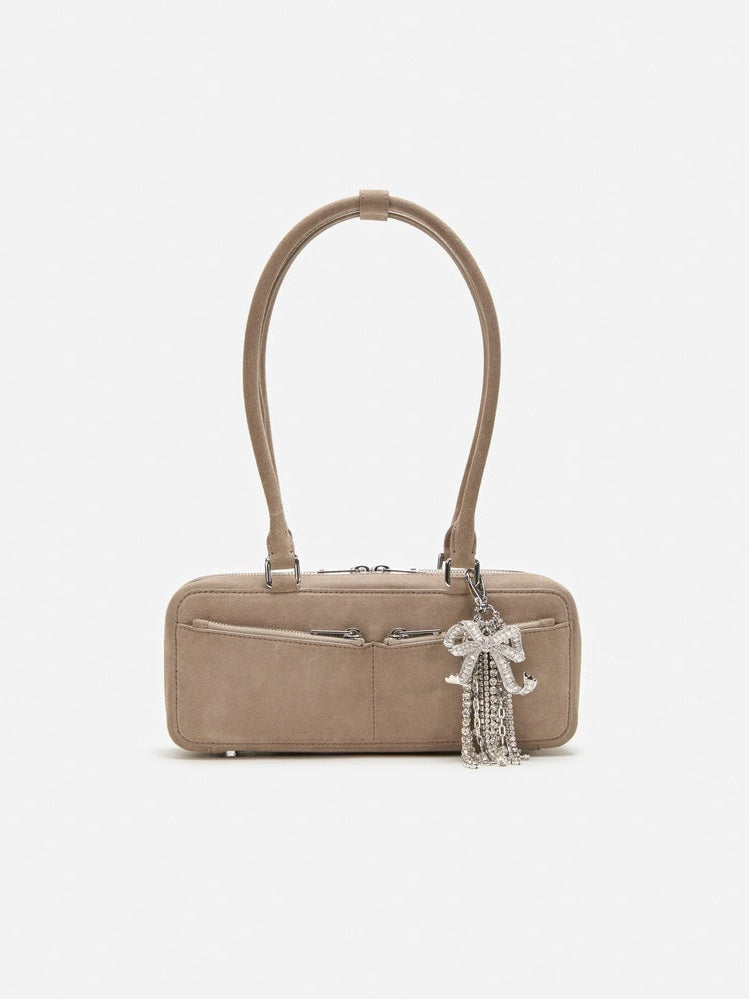 Grey suede baguette shoulder bag with charm