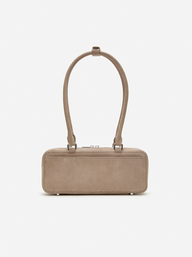 Grey suede baguette shoulder bag with charm