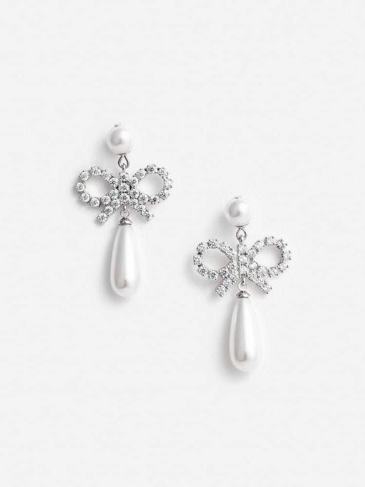 Pearl bow droplet earrings