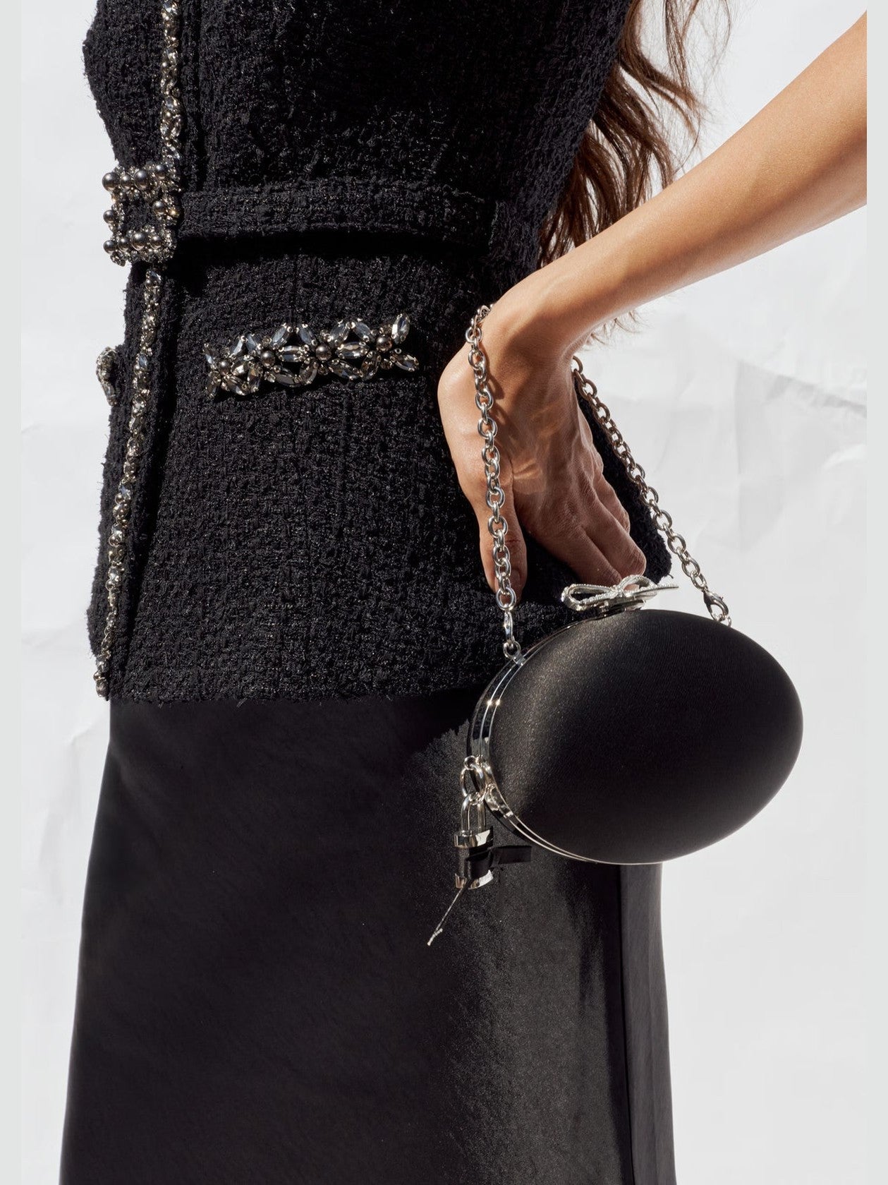 Black satin oval clutch