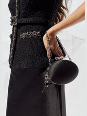 Black satin oval clutch