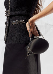 Black satin oval clutch