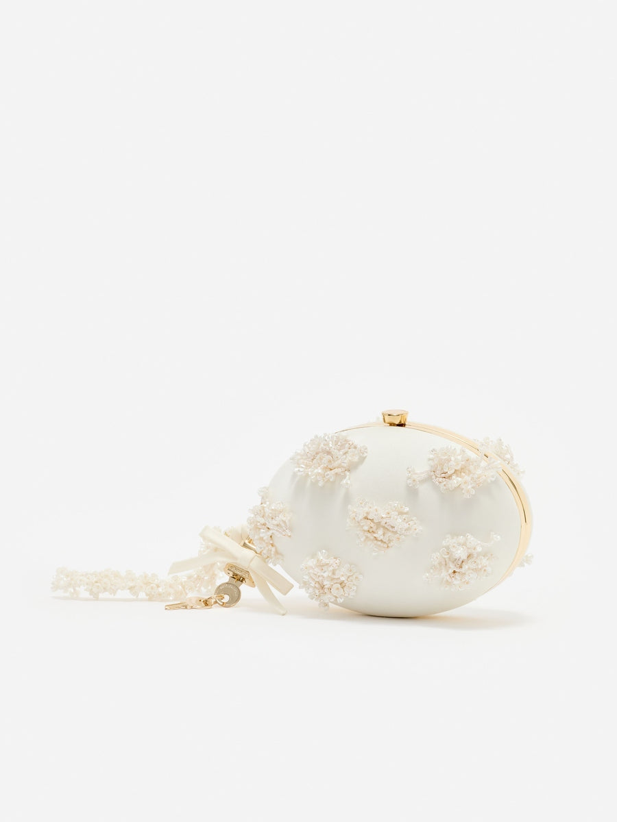 Cream satin floral beaded oval clutch
