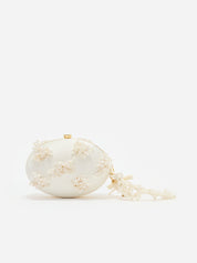 Cream satin floral beaded oval clutch
