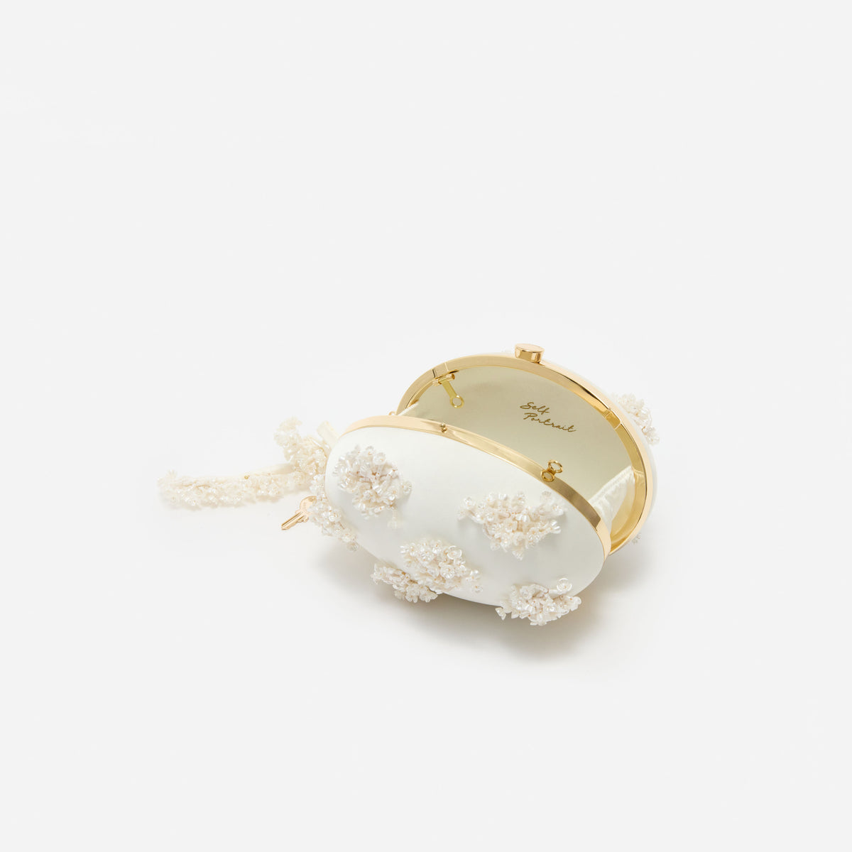 Cream satin floral beaded oval clutch