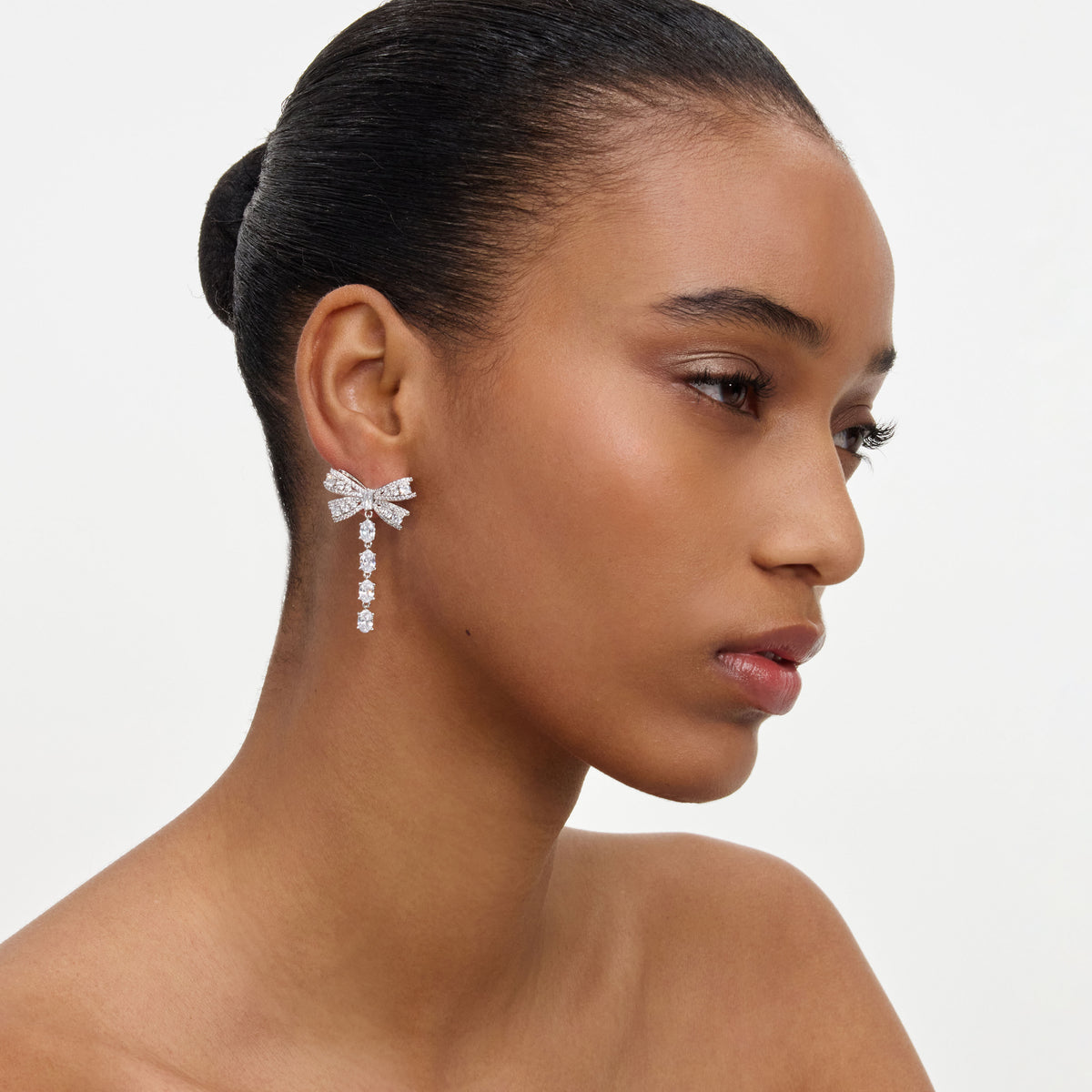 Crystal bow droplet earrings