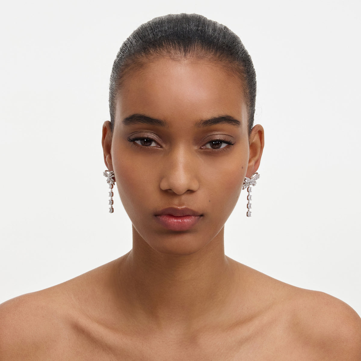 Crystal bow droplet earrings