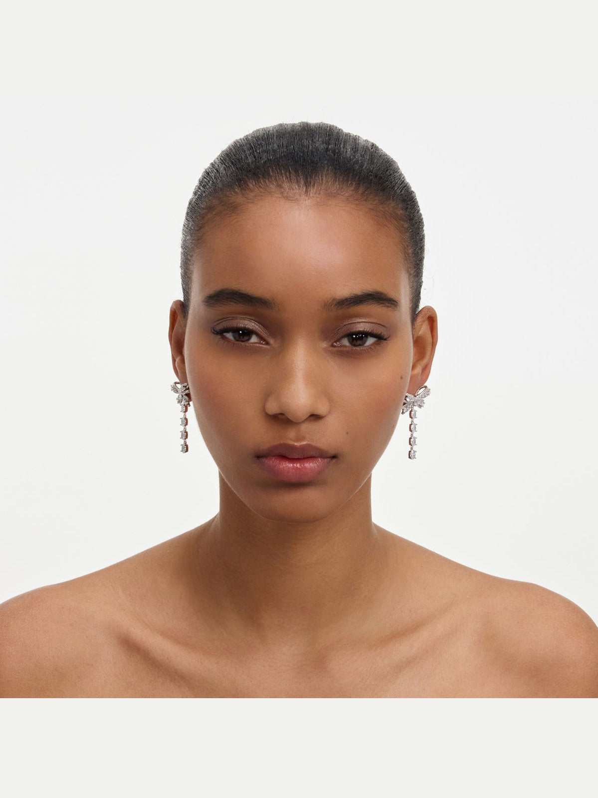 Crystal bow droplet earrings