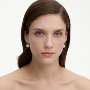 Crystal bow pearl back earrings