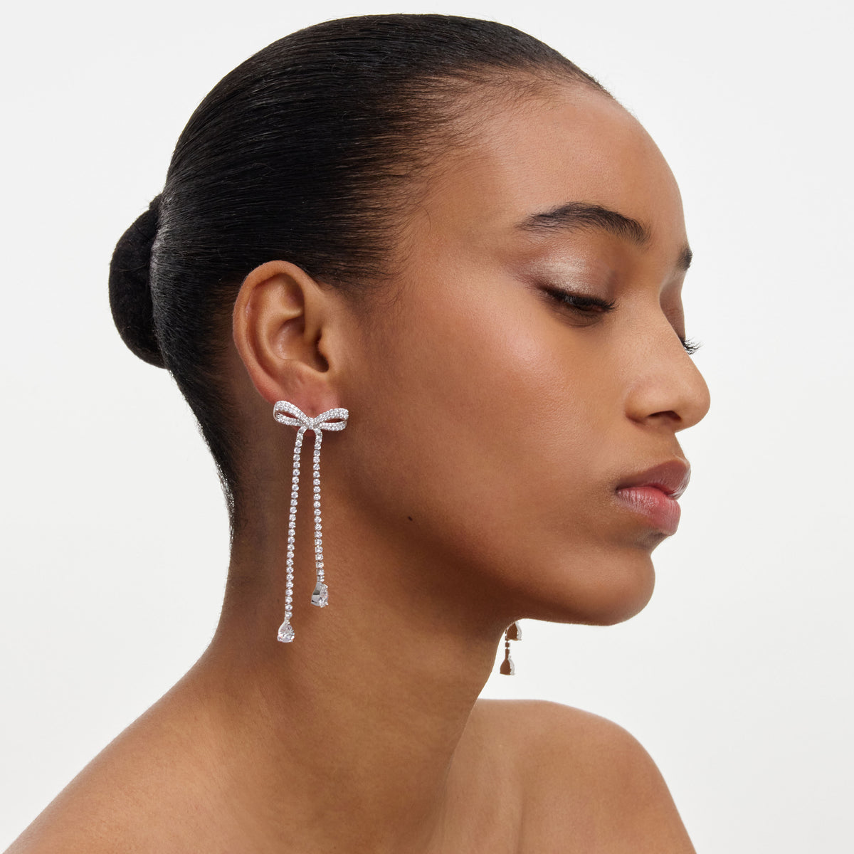 Crystal bow dangle earring