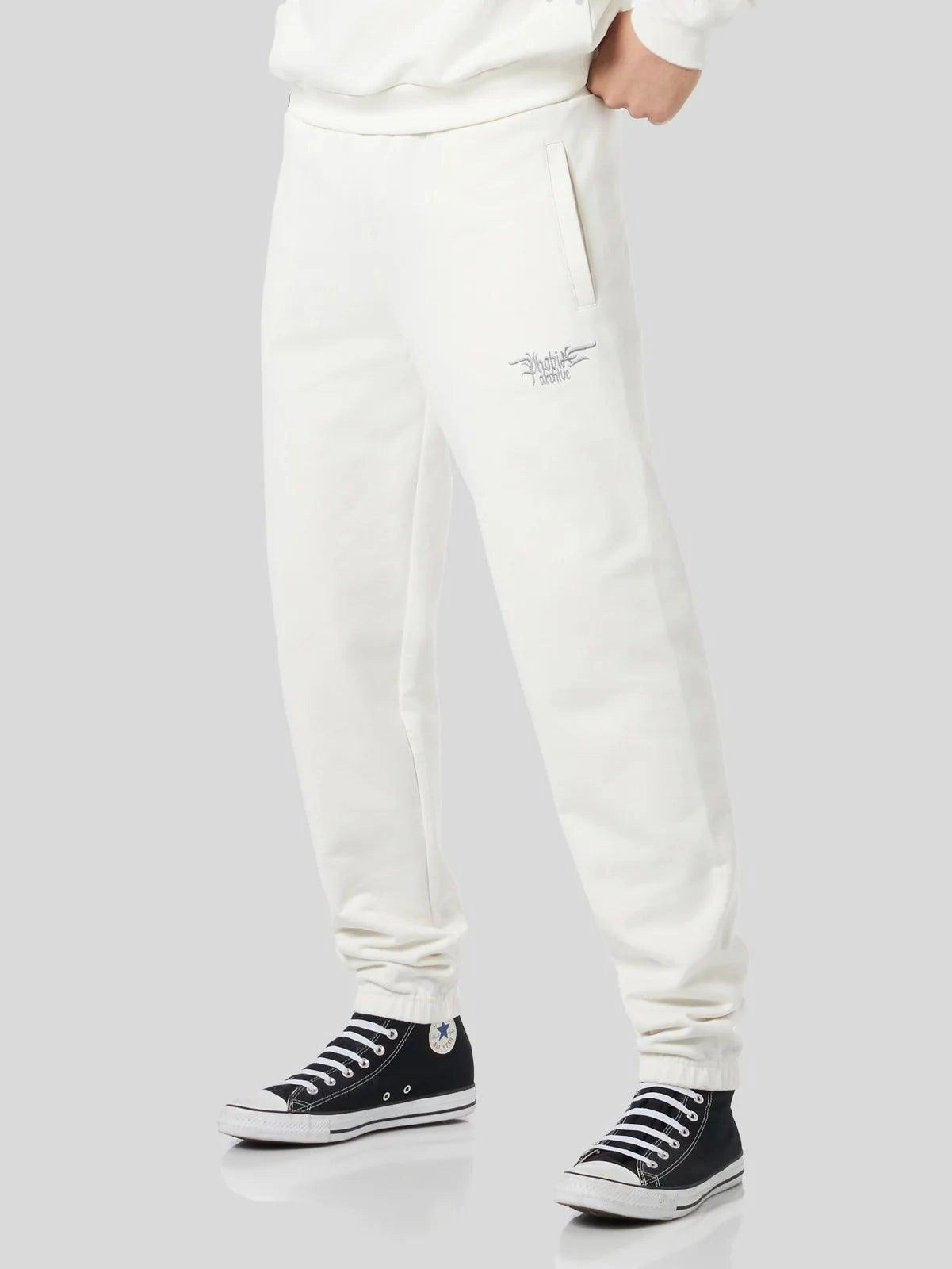 White pants with embroidered logo